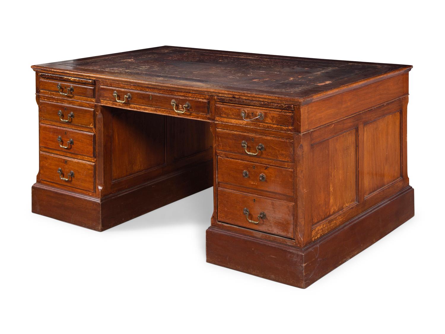 An Edwardian Tooled Leather-Inset Mahogany Partners' Desk