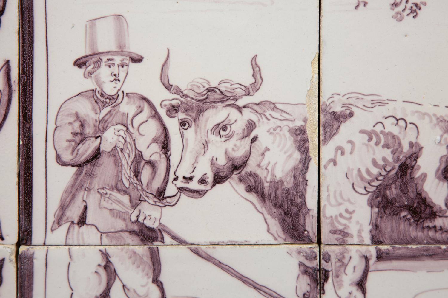 A Pair of Delftware Tile Plaques