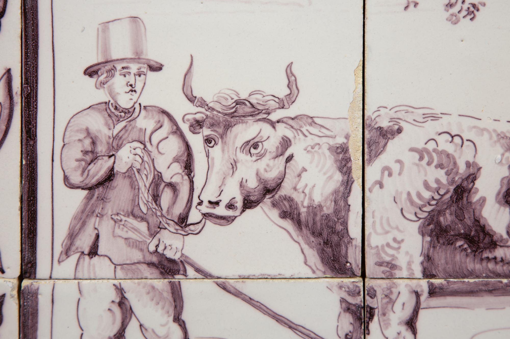 A Pair of Delftware Tile Plaques
