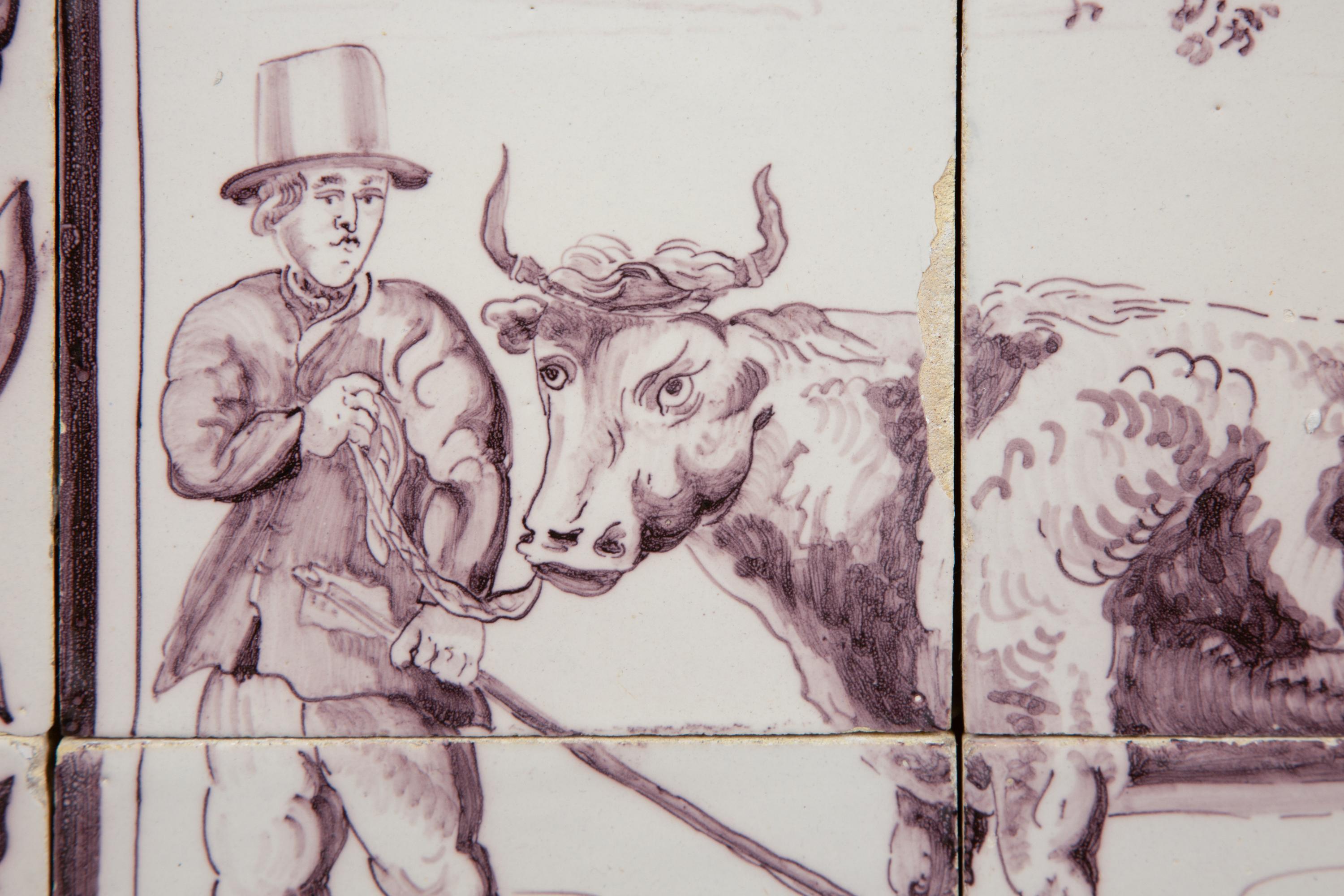 A Pair of Delftware Tile Plaques