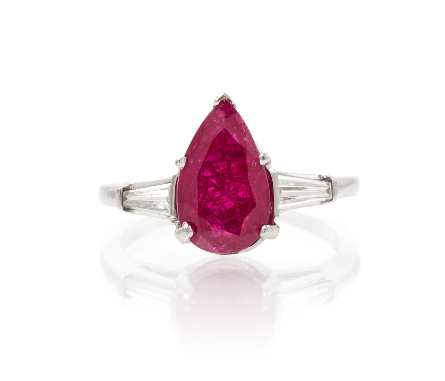 A Platinum, Synthetic Quench Crackled Ruby and Diamond Ring, 3.20 dwts.