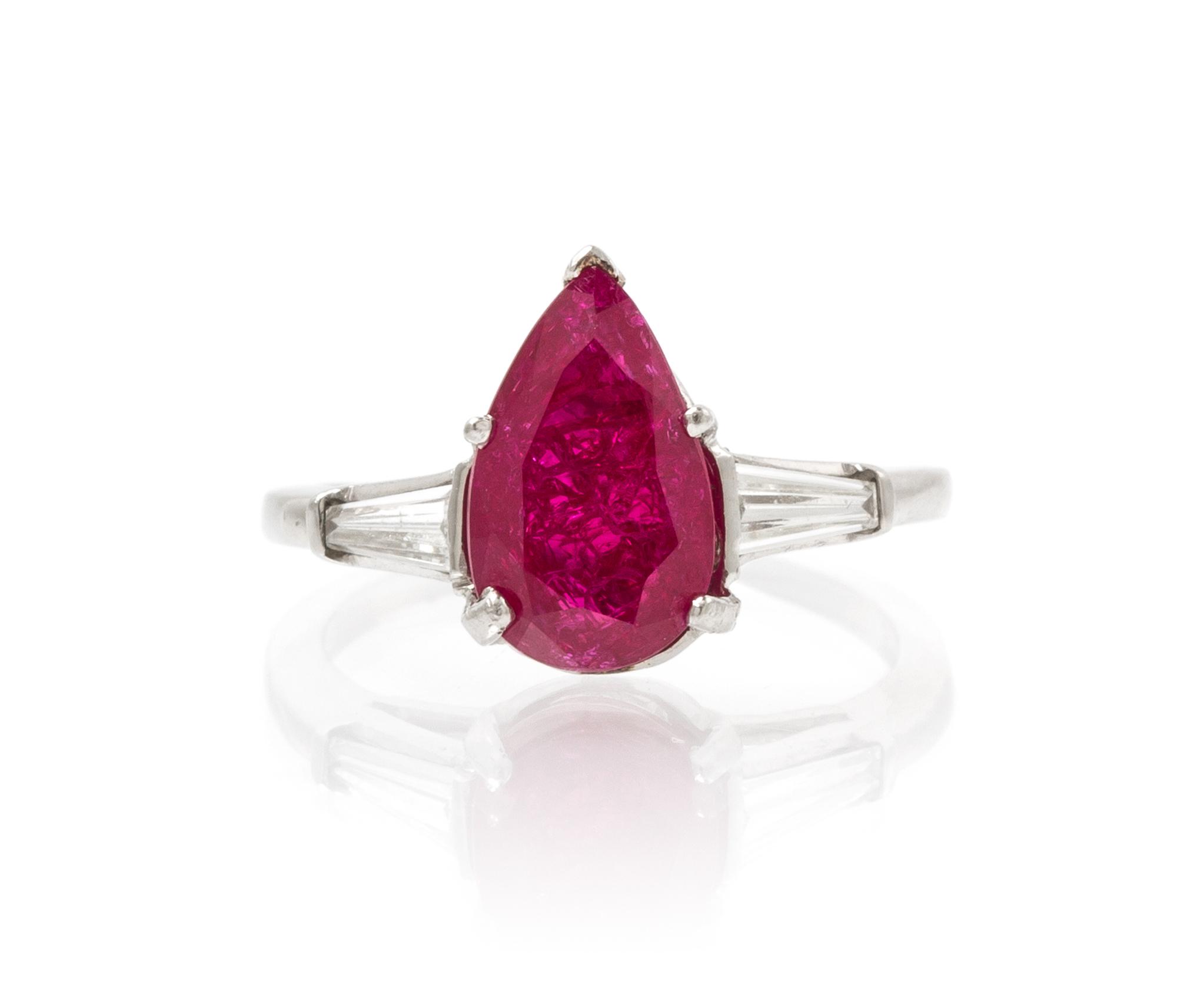 A Platinum, Synthetic Quench Crackled Ruby and Diamond Ring, 3.20 dwts.