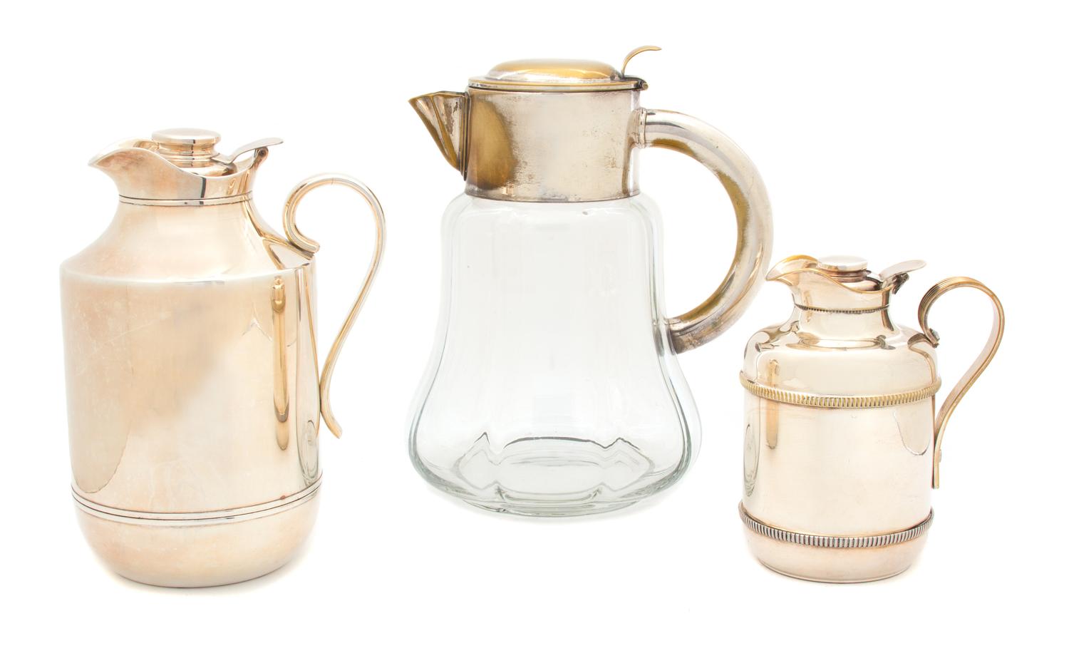 Three Water Pitchers Height of tallest 10 1/4 inches. — 20TH CENTURY