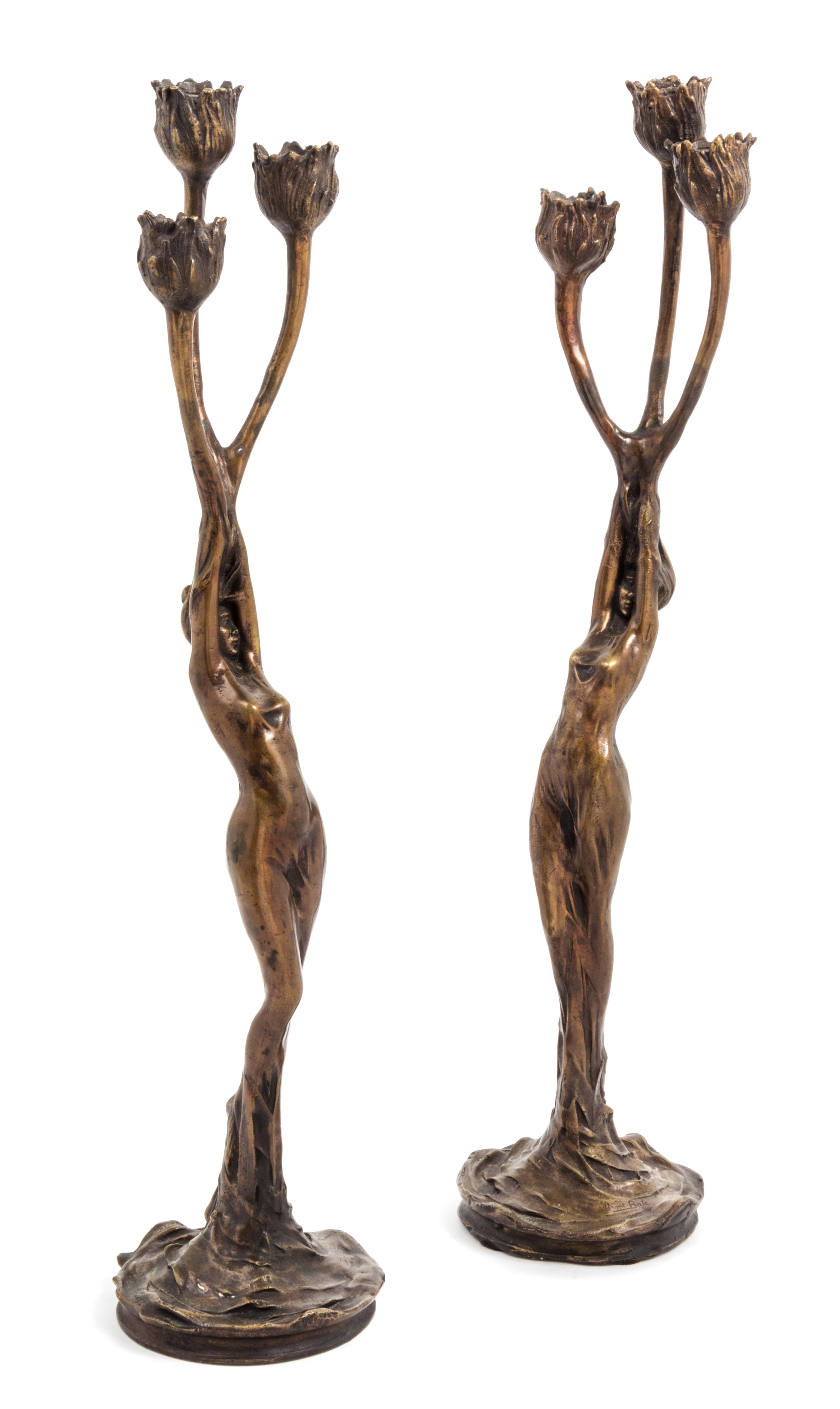After Firmin Bate, FRANCE, 20TH CENTURY, a pair of Art Nouveau three-light candelabra