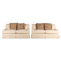 A Pair of Linen-Upholstered Two-Cushion Sofas with Custom Throw Pillows