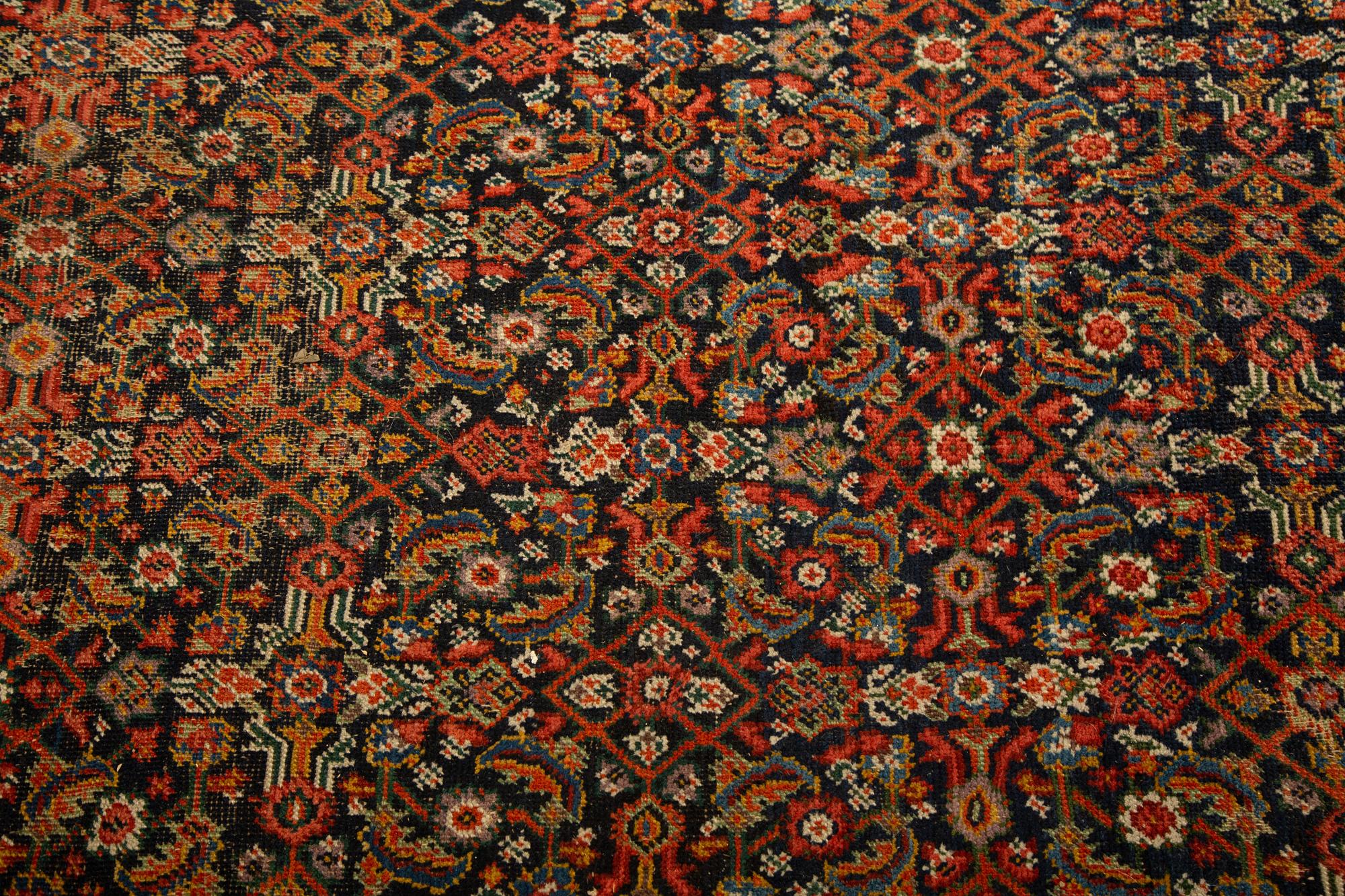 A Feraghan Wool Rug — Early 20th Century
