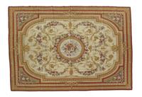 An Aubusson Style Needlepoint Rug 9 feet 8 inches x 7 feet 1 inch. — 20TH CENTURY