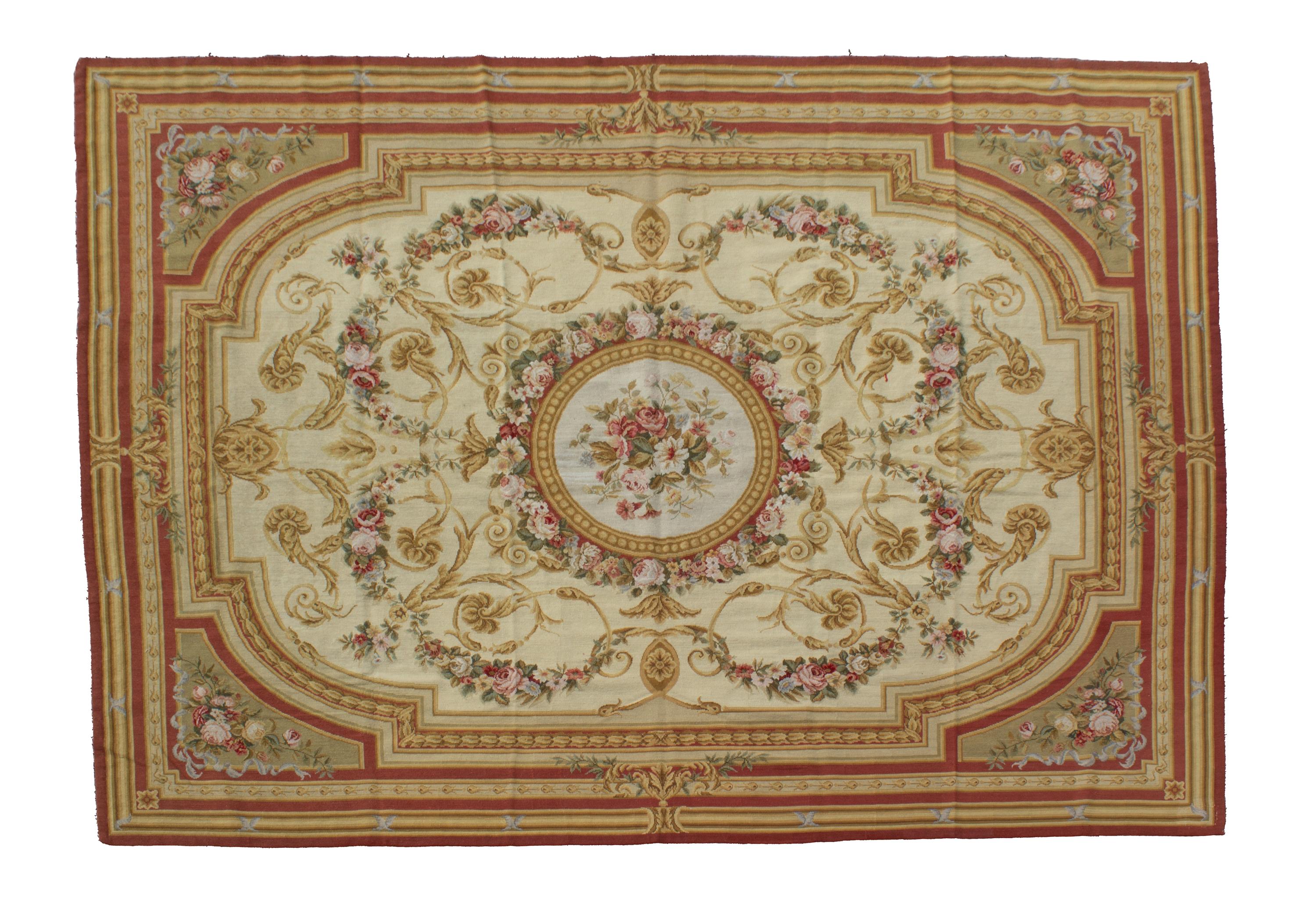 An Aubusson Style Needlepoint Rug 9 feet 8 inches x 7 feet 1 inch. — 20TH CENTURY