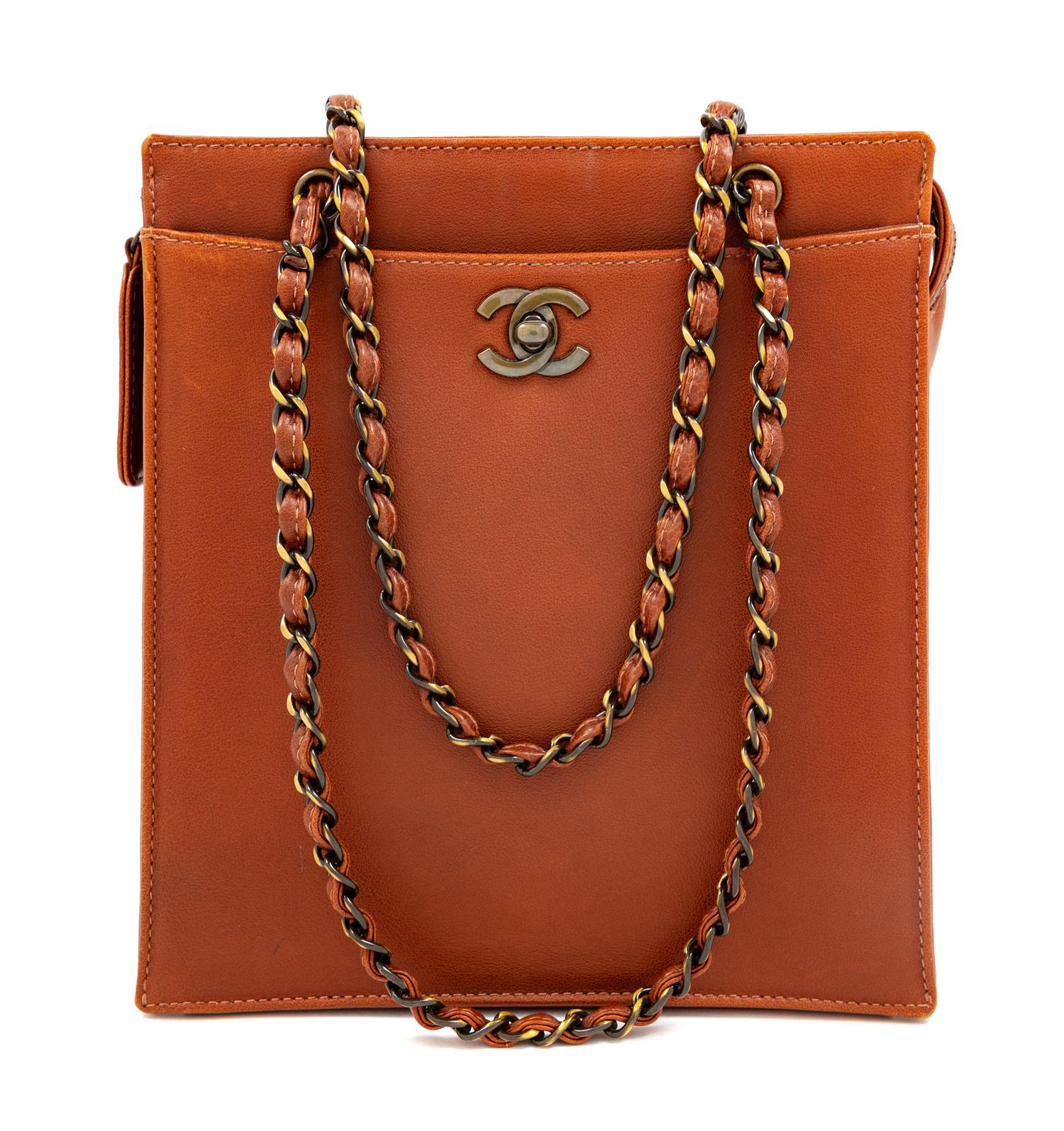 A Chanel Brown Leather Shoulder Bag, 8.5" L x 9.5" W x 3.5" D; Strap drop: 9".
