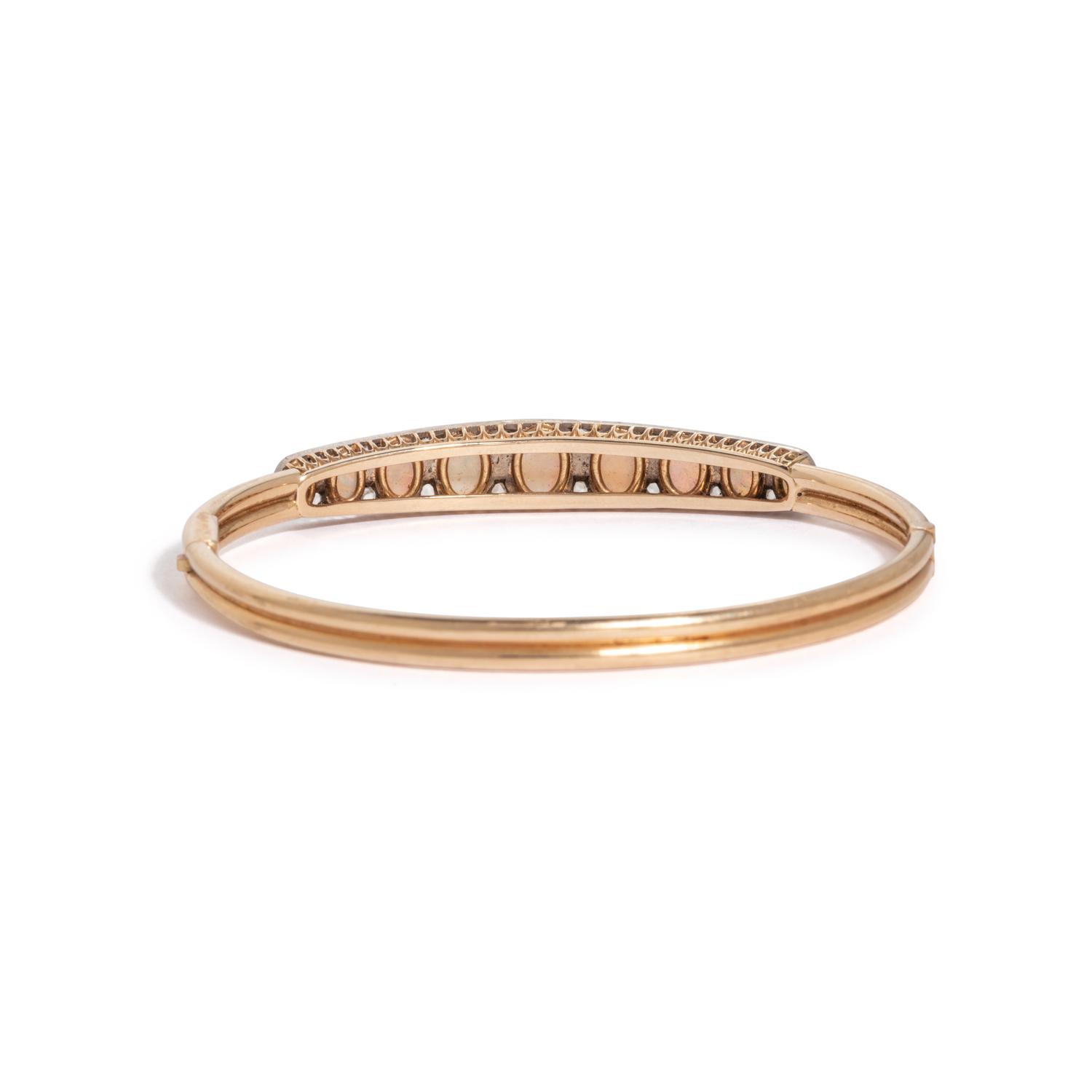 GOLD, OPAL, AND DIAMOND BANGLE BRACELET