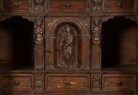 An Italian Carved Walnut Cabinet on Stand