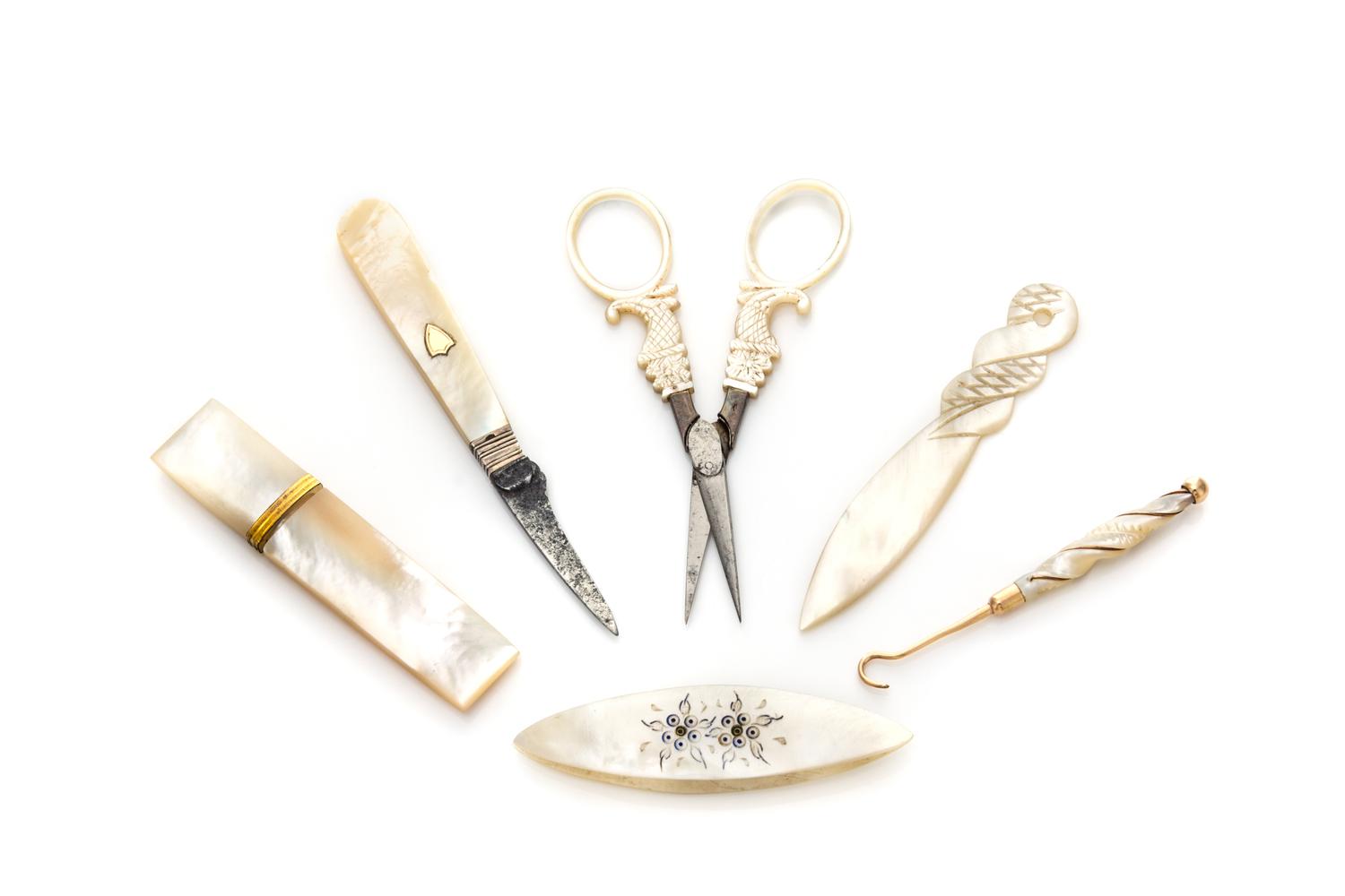 A Group of Six Palais Royal Mother-of-Pearl Sewing Articles, , comprising a knife, scissors, button hook, needle case, bodkin and threa