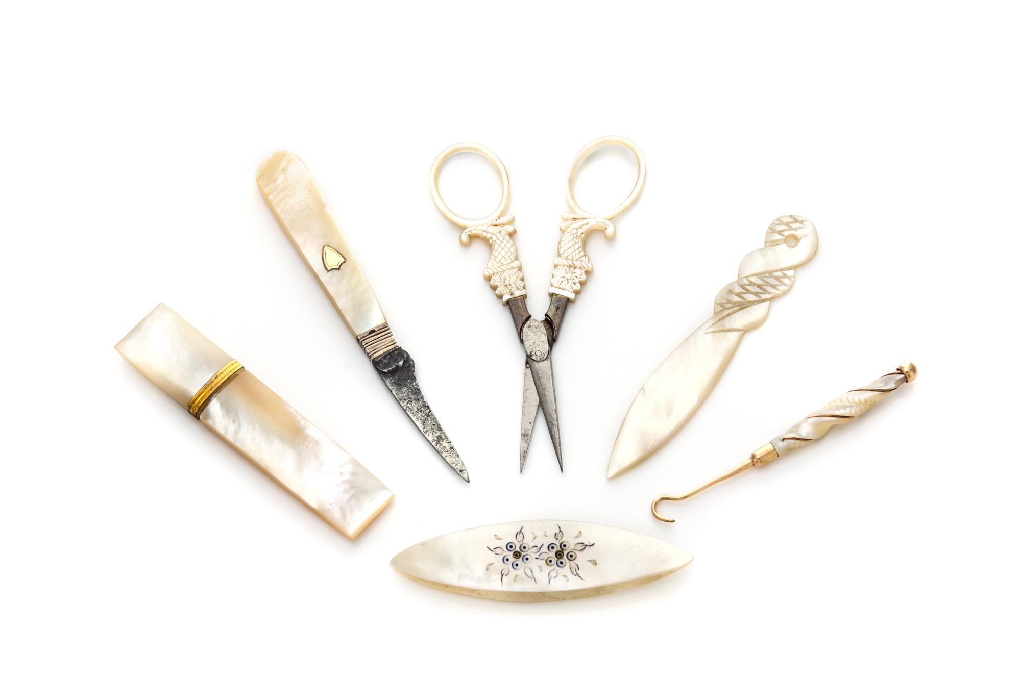 A Group of Six Palais Royal Mother-of-Pearl Sewing Articles, , comprising a knife, scissors, button hook, needle case, bodkin and threa