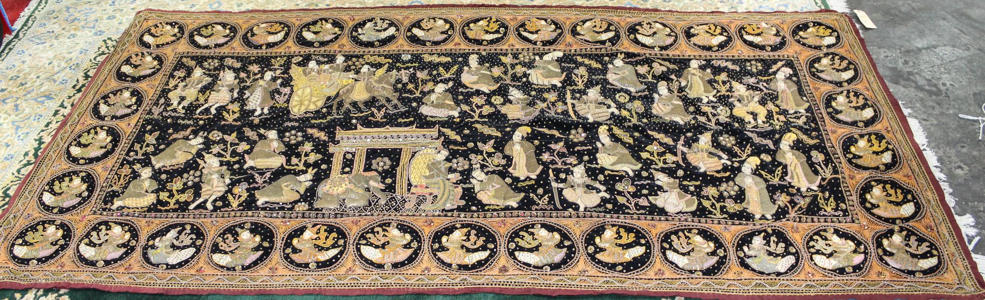 A Burmese Figural Tapestry 4 feet 11 1/2 inches x 10 feet 5 inches.
