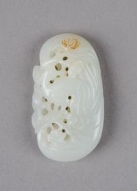 A Chinese Celadon Jade Pendant, Height 2 1/4 inches.