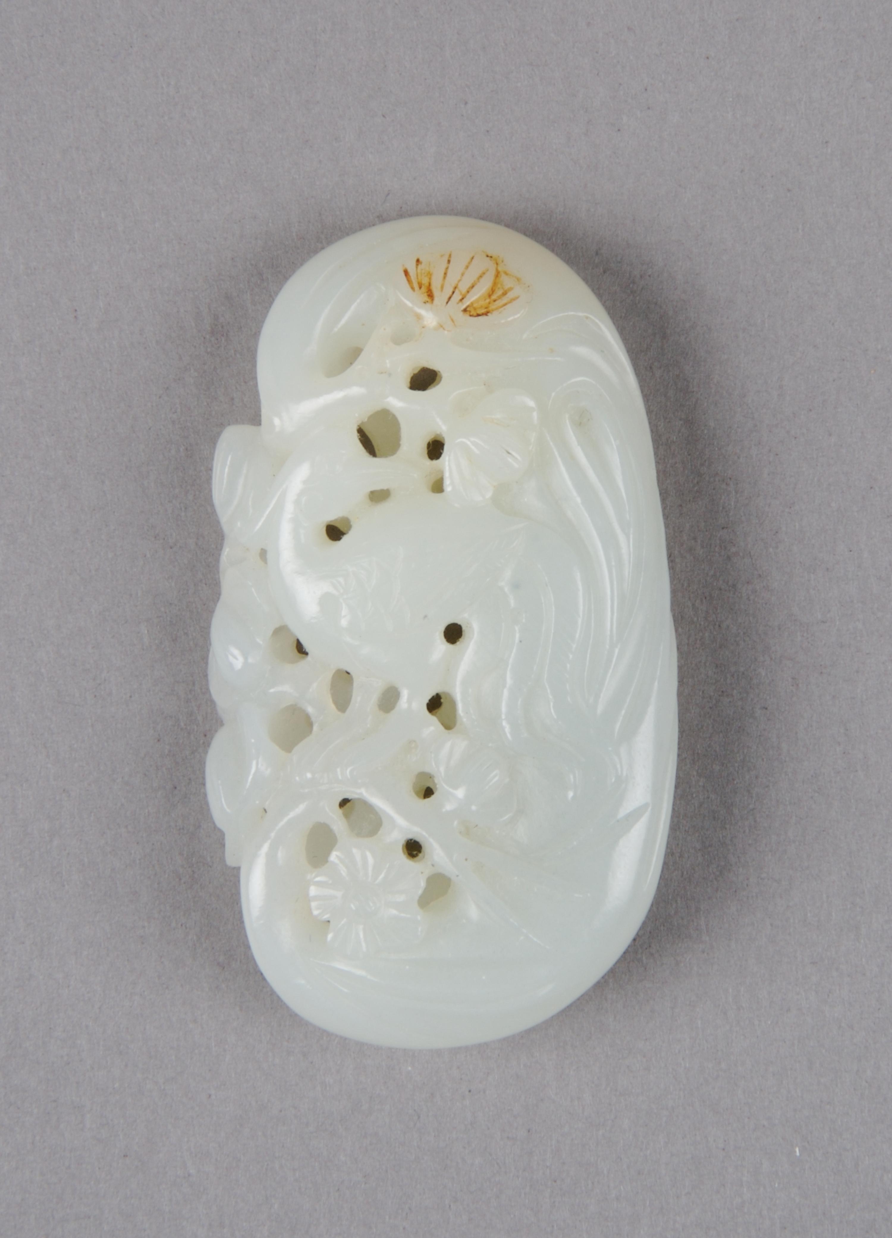 A Chinese Celadon Jade Pendant, Height 2 1/4 inches.