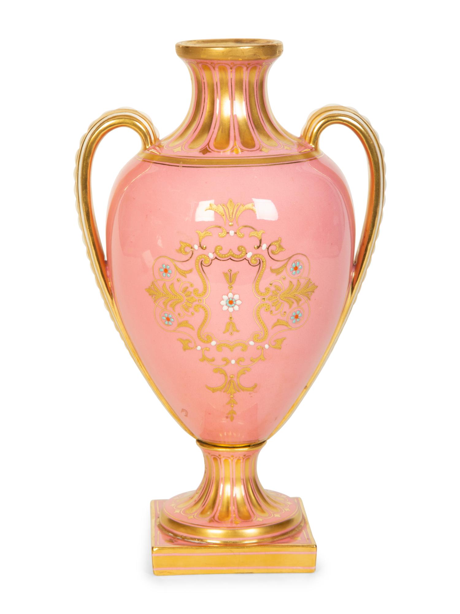 A Coalport Porcelain Pink-Glazed Urn