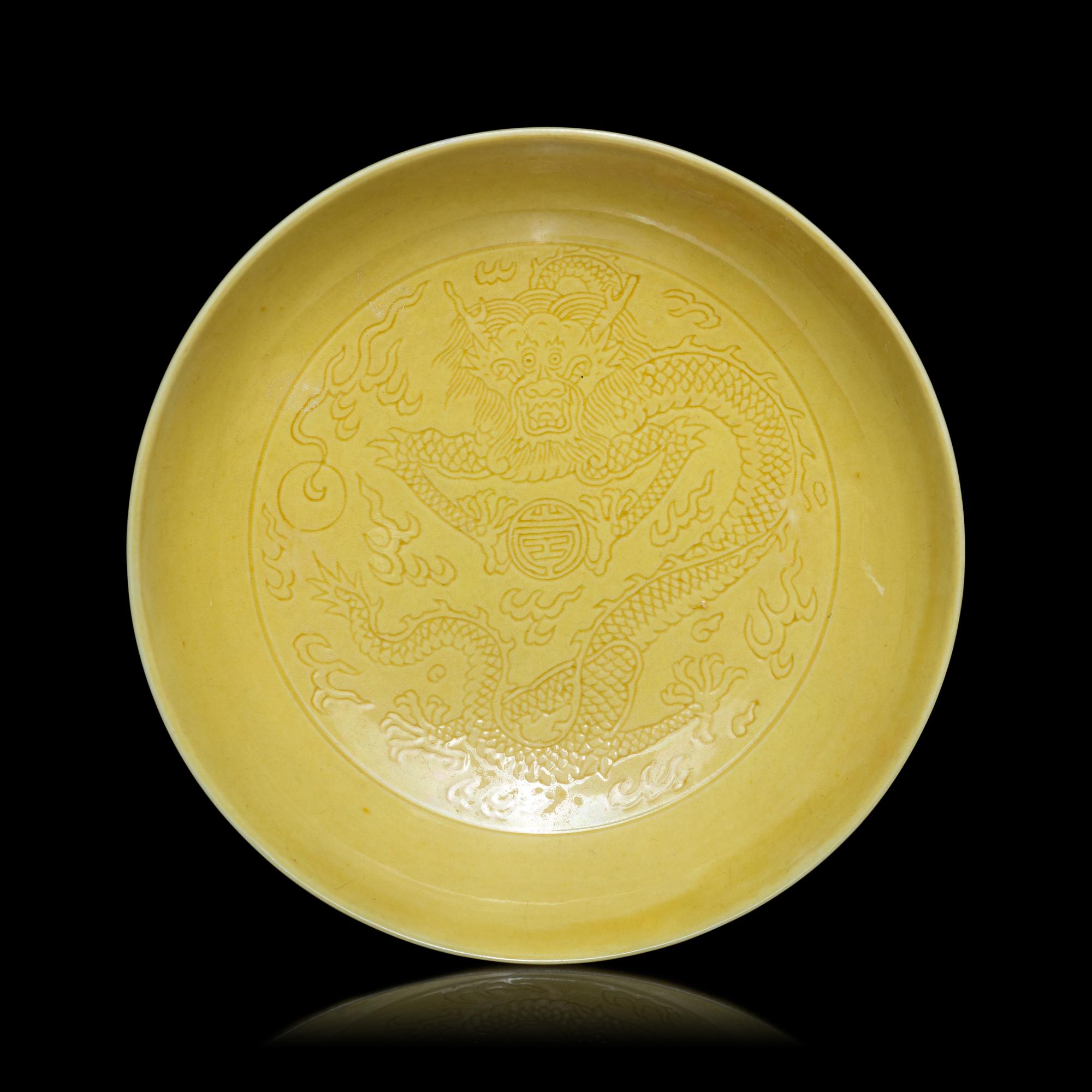 A Pair of Chinese Yellow Glazed Incised Porcelain 'Dragon' Dishes, Qianlong Marks and of the Period 清乾隆 嬌黃釉龍紋碟一對