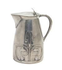 An Art Nouveau Pewter Cream Jug Height 5 inches. — LATE 19TH CENTURY