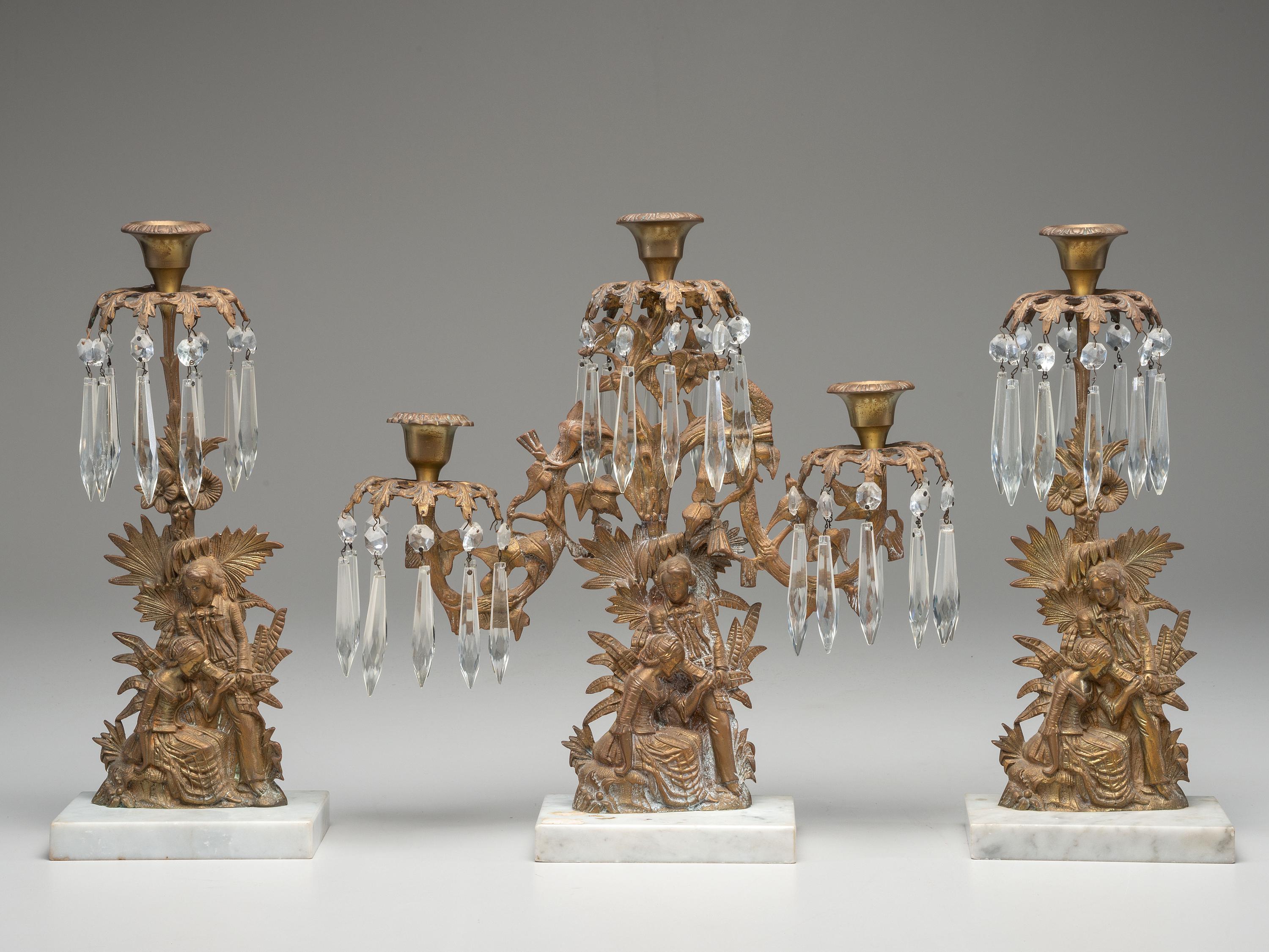 A Classical Gilt and Glass Three-Piece Girandole Garniture