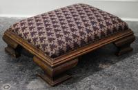 An Empire Style Foot Stool Height 4 1/2 x width 16 x depth 12 3/4 inches.