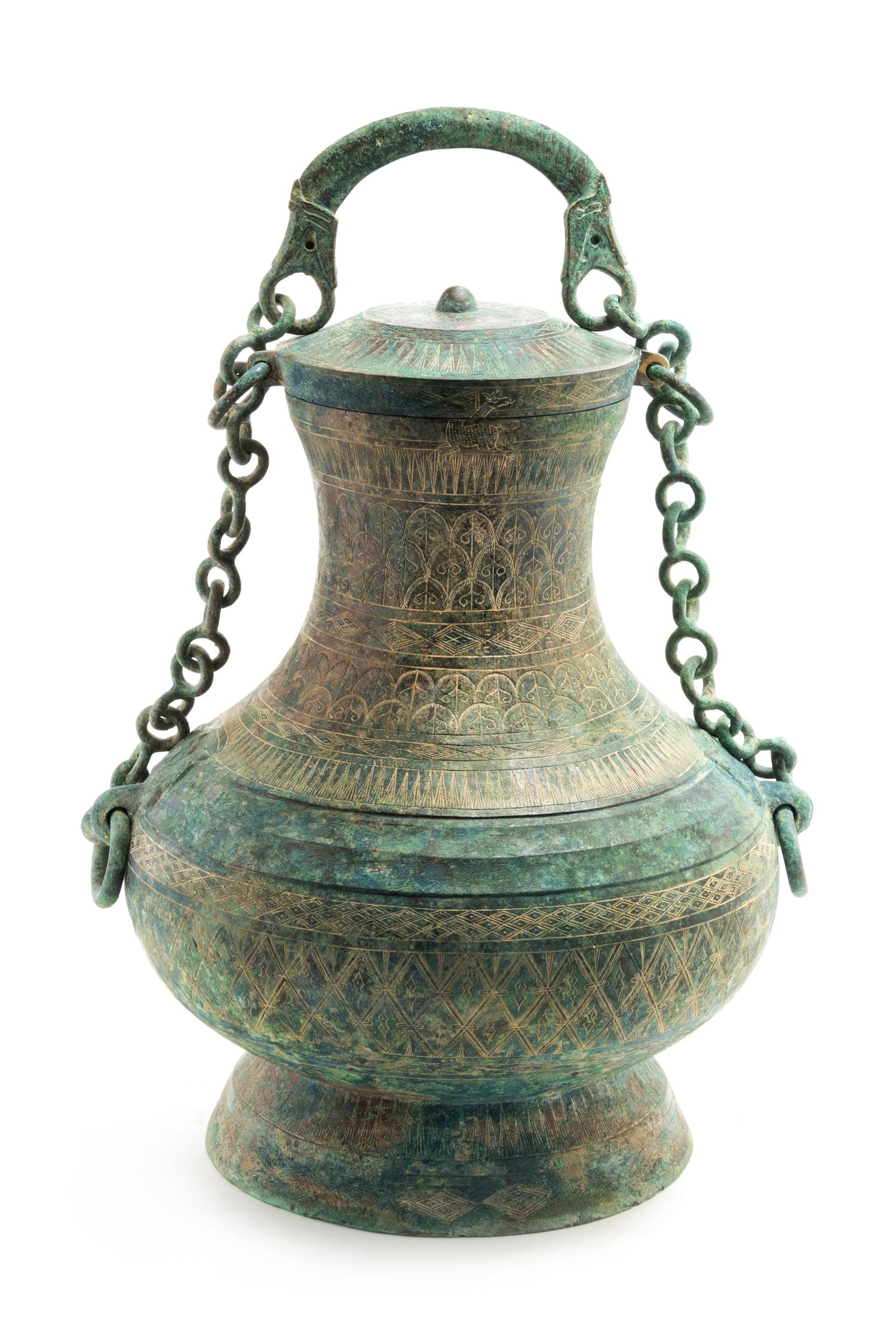 An Archaic Bronze Ritual Wine Vessel, Tilianghu Height 12 1/2 x width 9 1/2 inches. — EASTERN HAN DYNASTY (25-220)