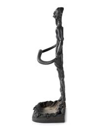 A Cast Iron Putto and Serpent Umbrella Stand