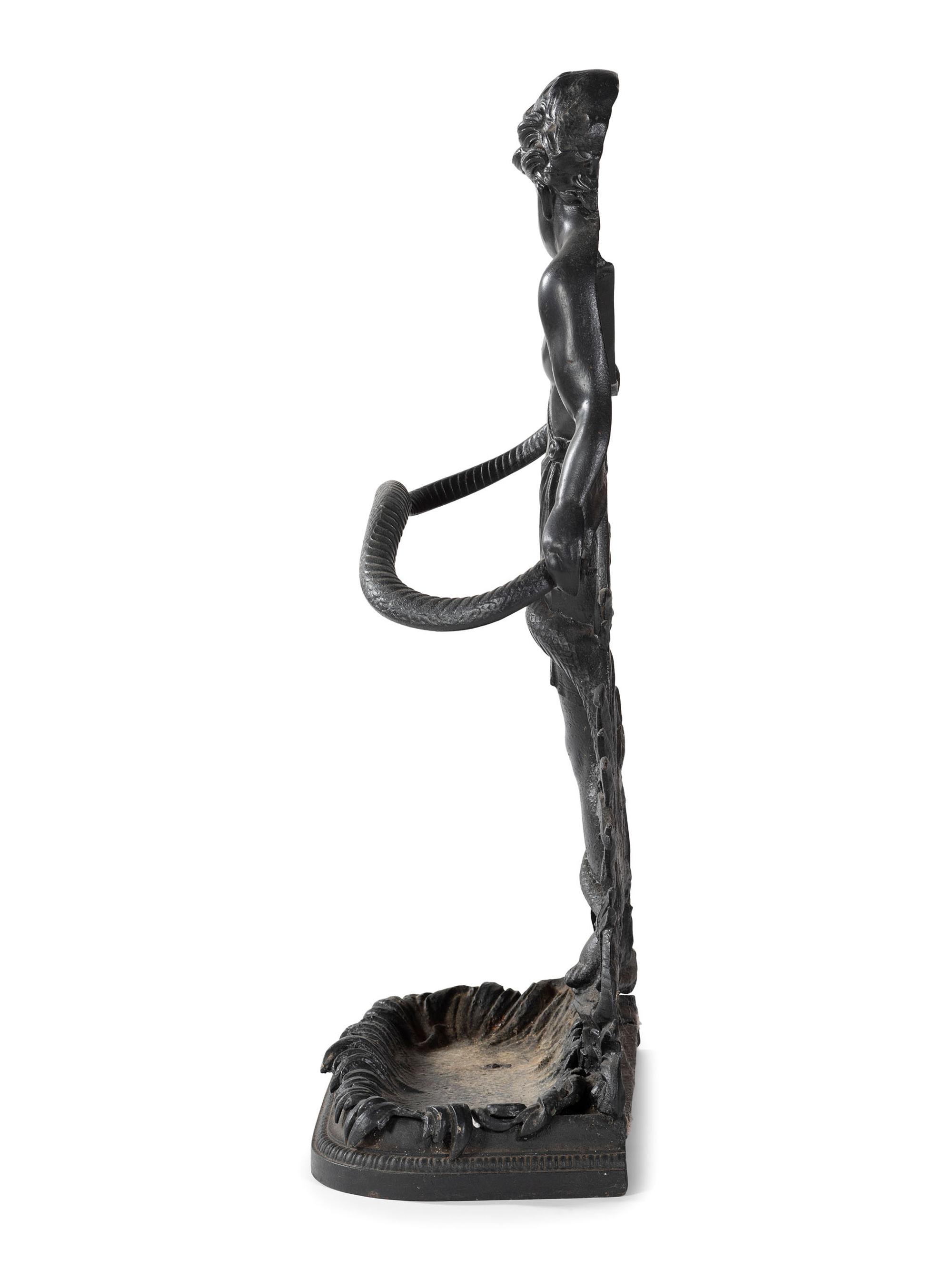 A Cast Iron Putto and Serpent Umbrella Stand