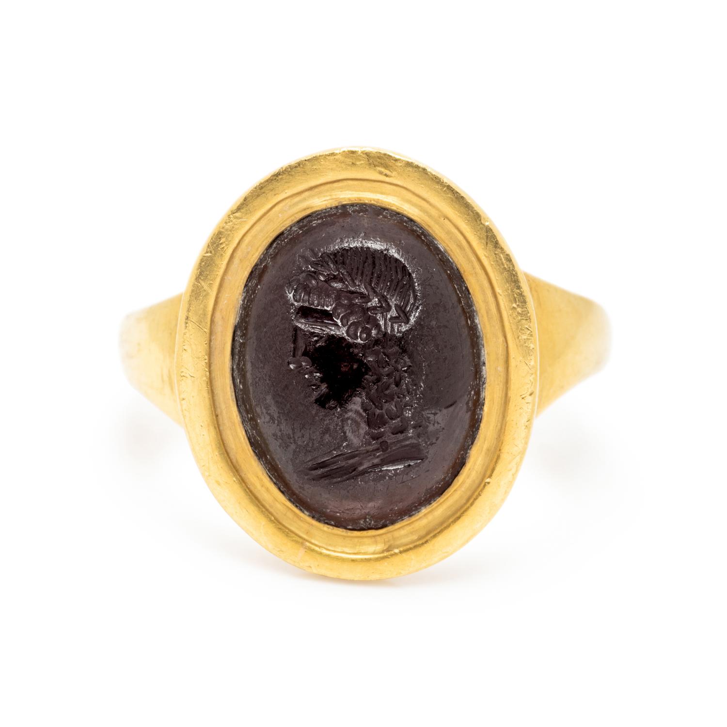 ATTILIO CODOGNATO, YELLOW GOLD AND GARNET INTAGLIO RING