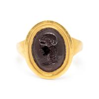 ATTILIO CODOGNATO, YELLOW GOLD AND GARNET INTAGLIO RING
