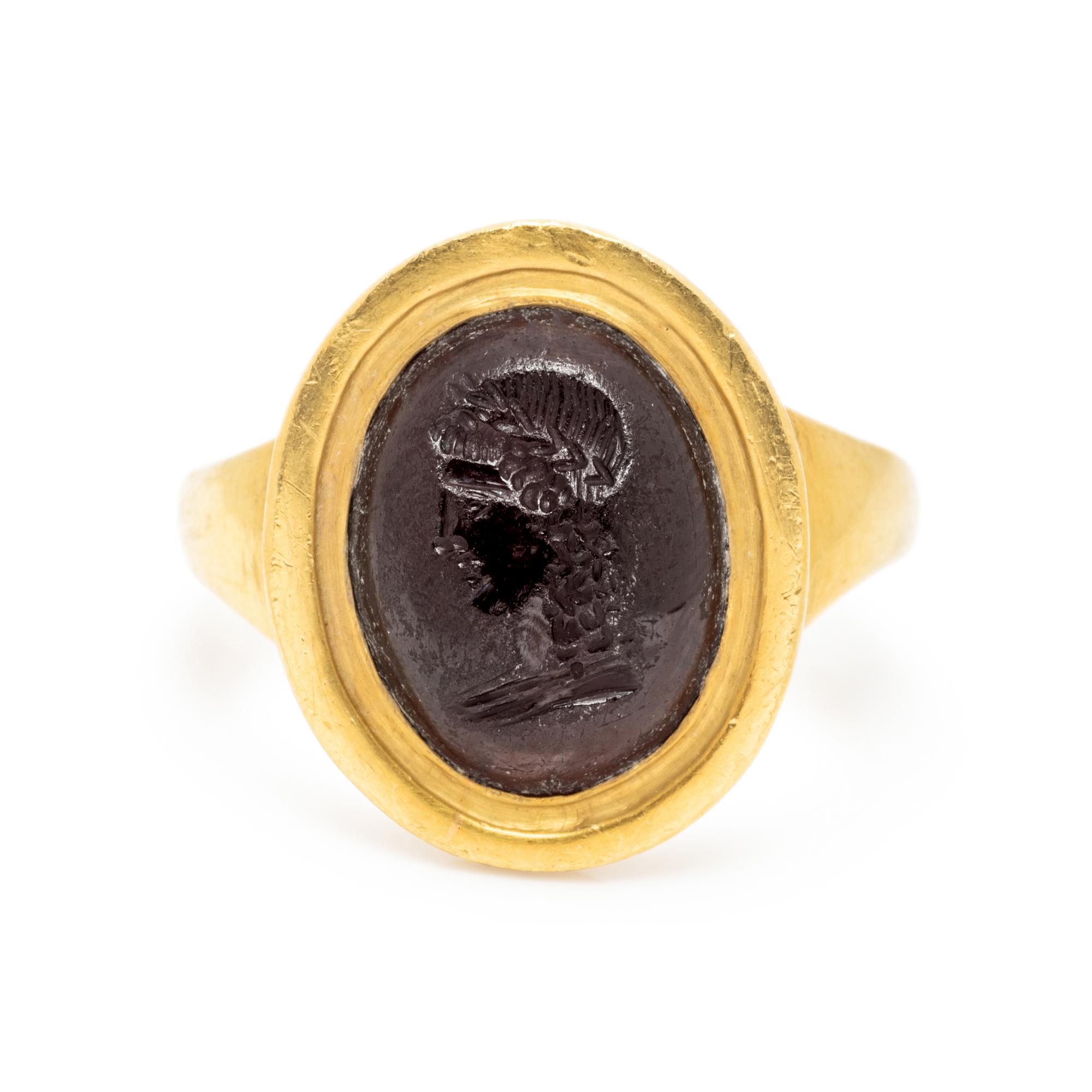 ATTILIO CODOGNATO, YELLOW GOLD AND GARNET INTAGLIO RING