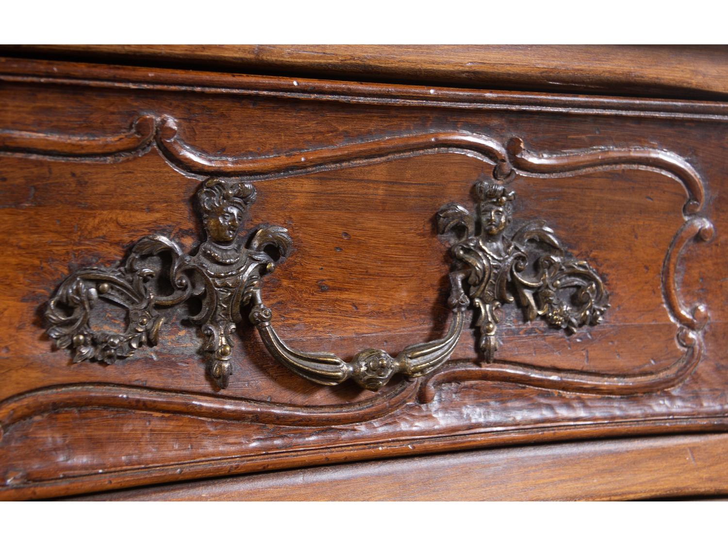 A Louis XV Provincial Style Walnut Commode