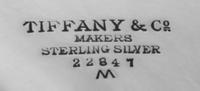 An American Silver Center Bowl, Tiffany & Co., New York, NY, the bowl centered with engraved monogram CDC, raised on a circular foot.