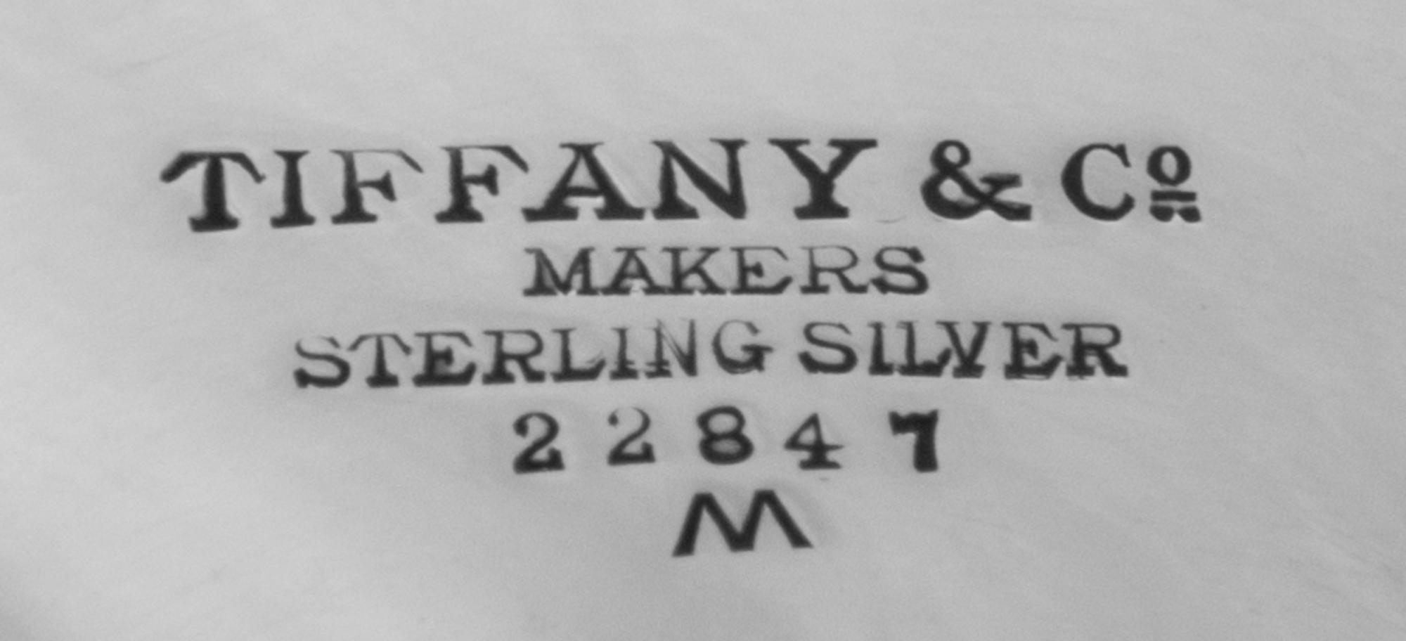 An American Silver Center Bowl, Tiffany & Co., New York, NY, the bowl centered with engraved monogram CDC, raised on a circular foot.