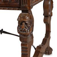 A Spanish Baroque Style Iron-Mounted Oak Table