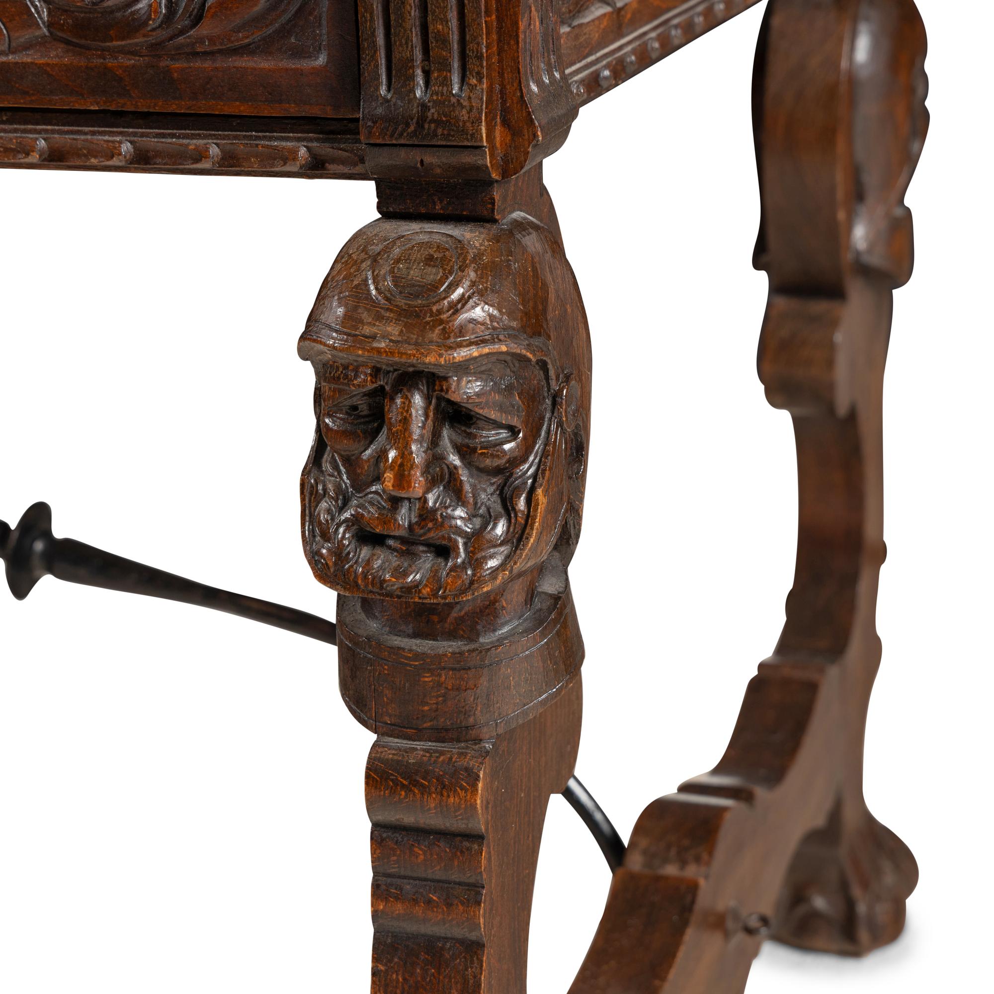 A Spanish Baroque Style Iron-Mounted Oak Table