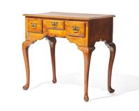 A George II yew dressing table, circa 1750