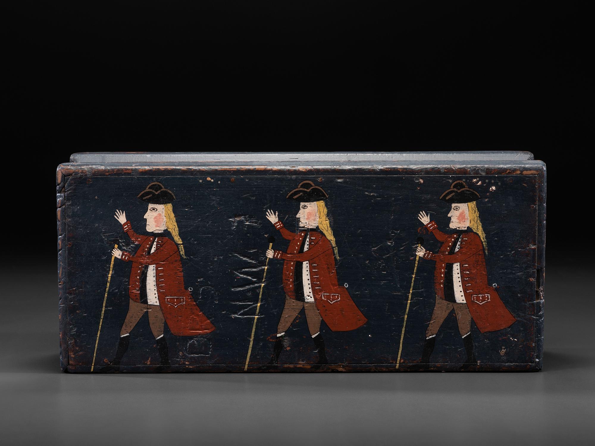 A Folk Art Carved and Painted Box