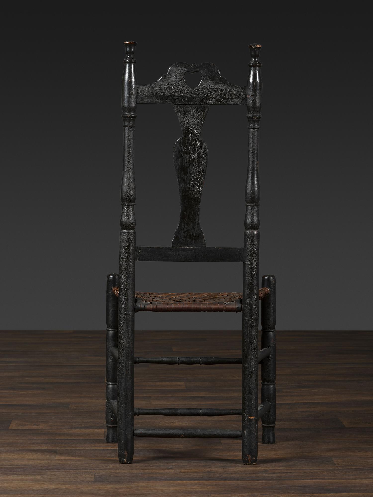 A Queen Anne Black Painted 'Heart and Crown' Splint Seat Side Chair
