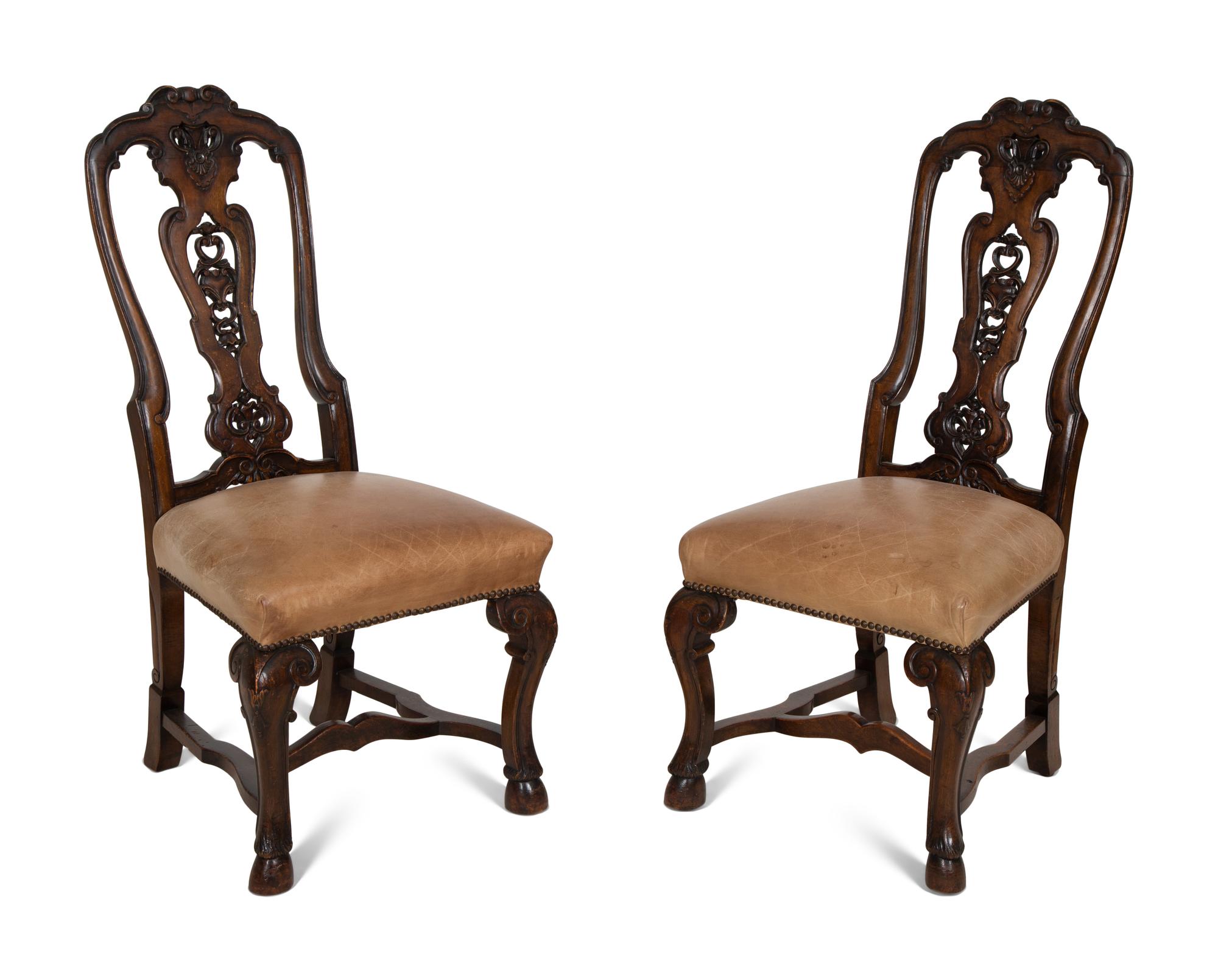 A Set of Six Continental Walnut Dining Chairs
