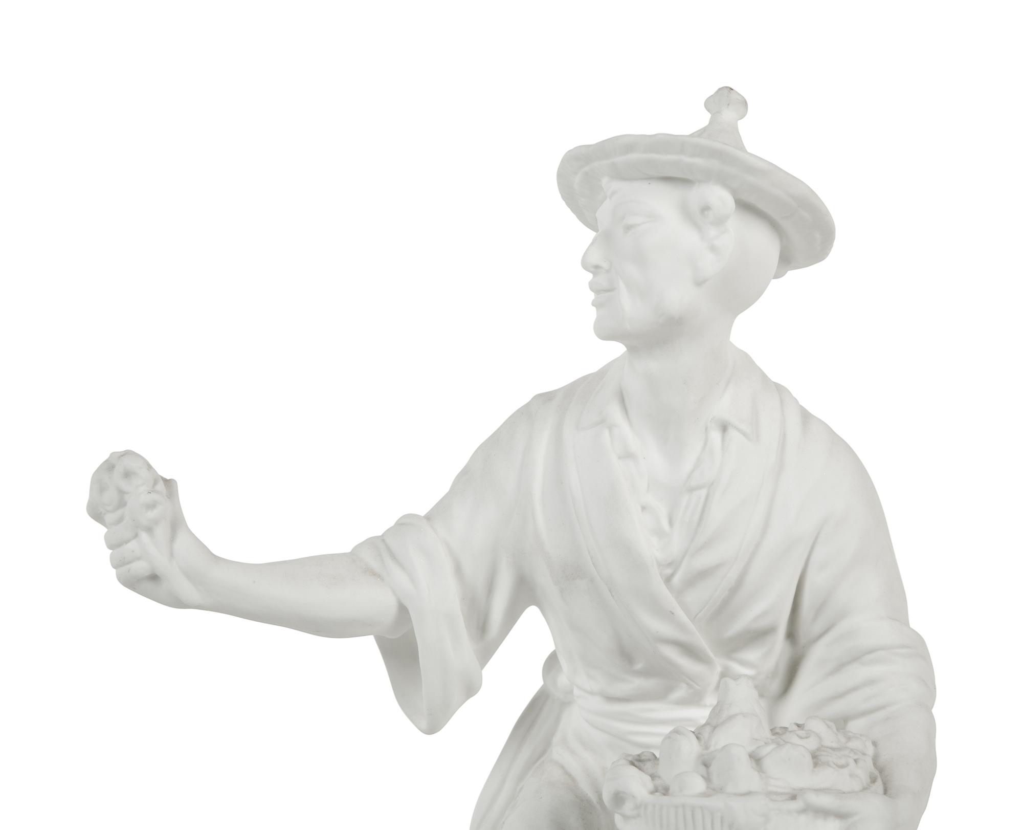 A Pair of Royal Worcester Porcelain Chinoiserie Figures