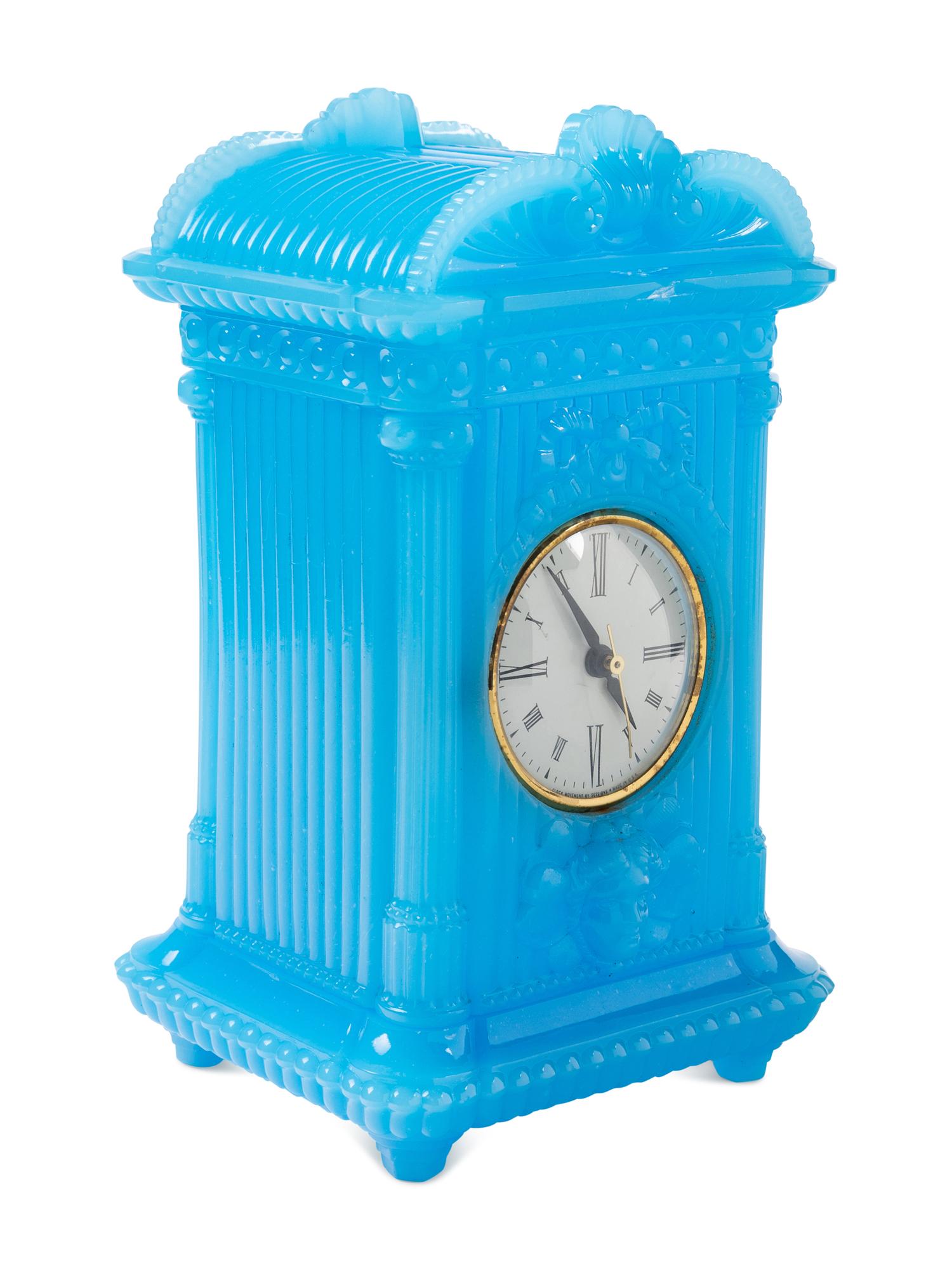 A Continental Blue Opaline Glass Three-Piece Clock Garniture