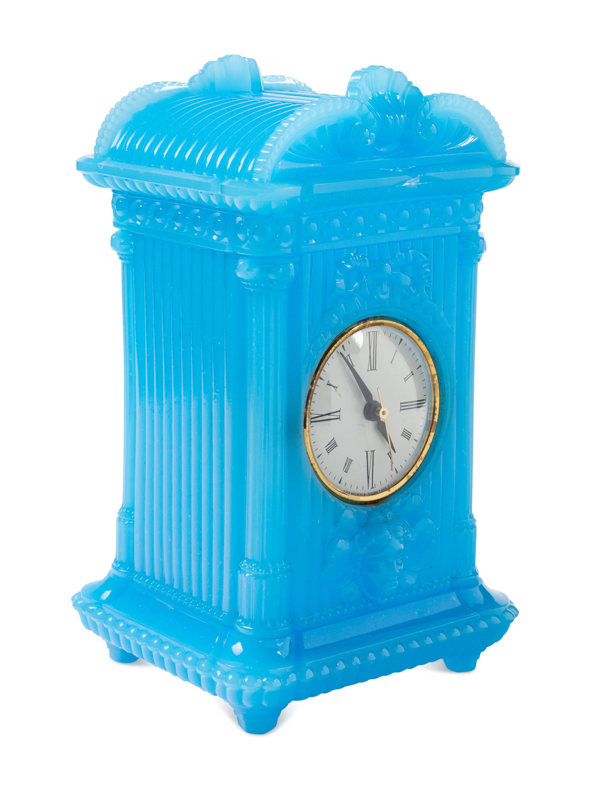 A Continental Blue Opaline Glass Three-Piece Clock Garniture