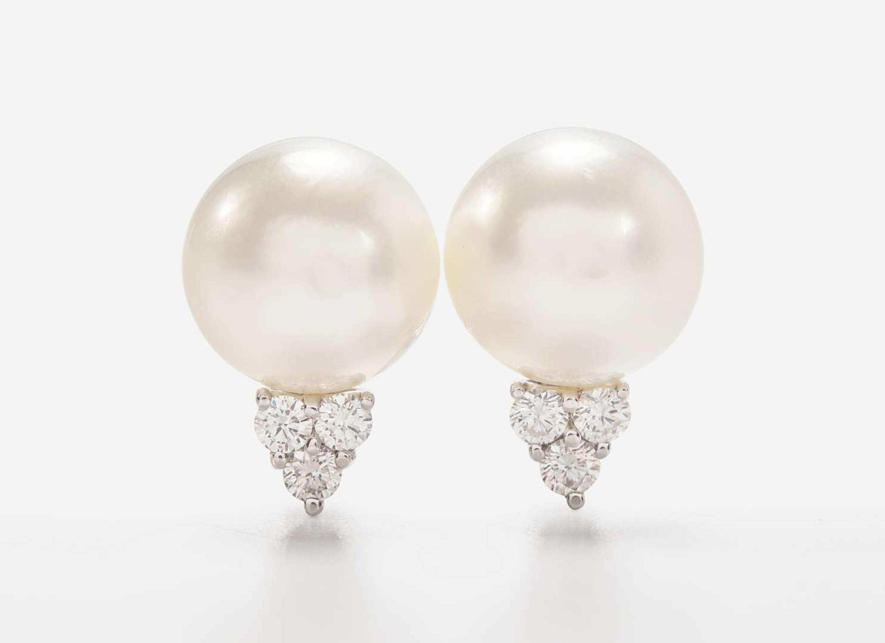An 18K White Gold, South Sea Pearl, and Diamond Earrings and Necklace Suite