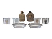 [MILITARIA]. World War II and Korean War-era canteens, canteen covers, and mess kits.