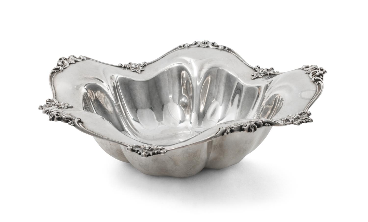 An American Silver Bowl, Reed & Barton, Taunton, MA, of lobed circular form with an applied foliate scroll border, monogrammed W.