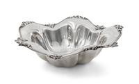 An American Silver Bowl, Reed & Barton, Taunton, MA, of lobed circular form with an applied foliate scroll border, monogrammed W.