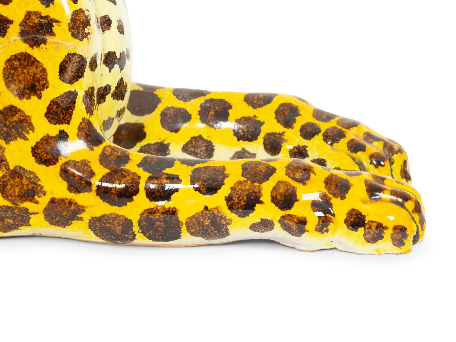 An Italian Glazed Ceramic Reclining Leopard