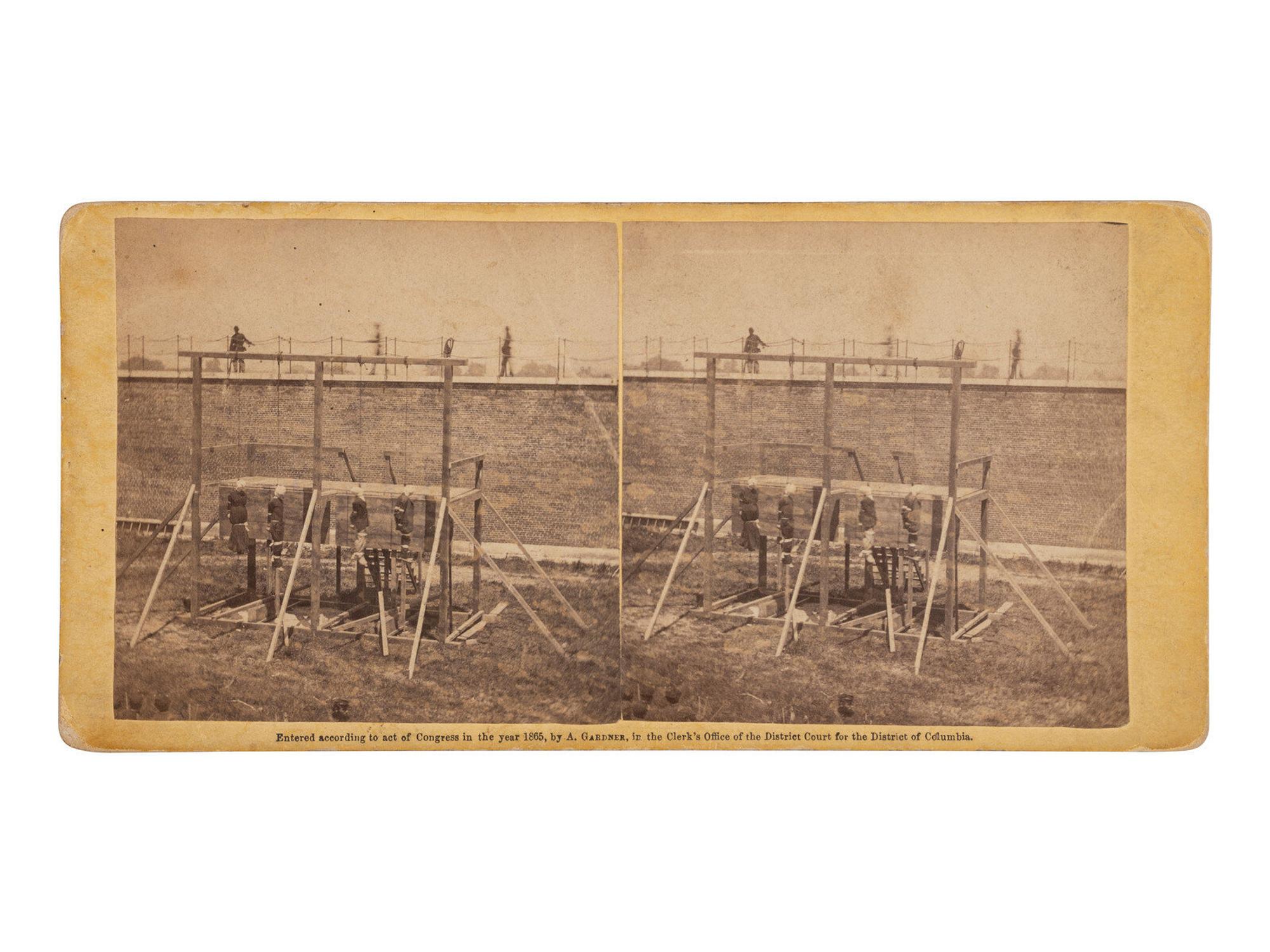 [LINCOLN ASSASSINATION]. GARDNER, Alexander (1821-1882), photographer. Pair of stereoviews of the Execution of the Conspirators. Washington: Philp & Solomons, ca 1865.