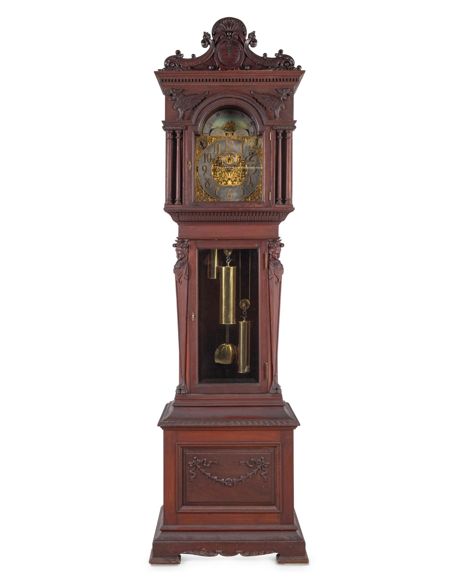 A Renaissance Revival Carved Walnut Tall Case Clock